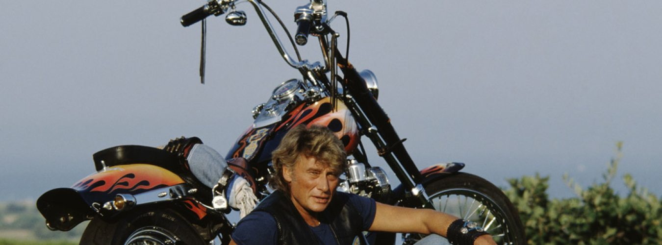 Johnny Hallyday et sa Harley Davidson Softail Heritage en 1992.